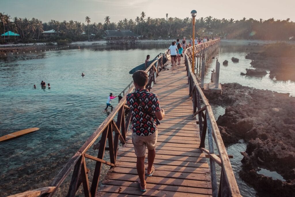 Wooden bridge in General Luna, Siargao Island, Philippines at sunset