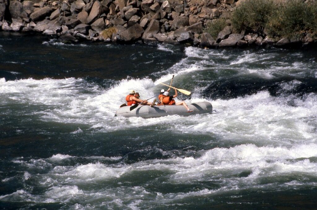 Whitewater rafting on river rapids